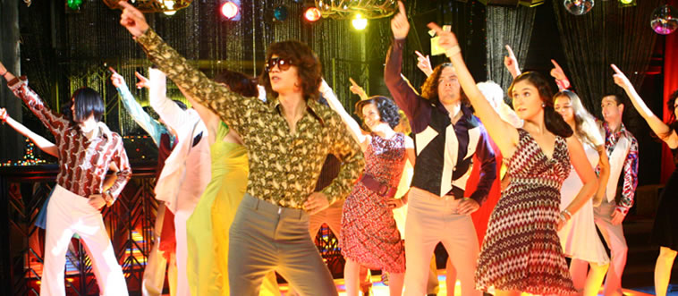 Let's start with a classic rhythm: what musical style took over the 1970s club scene with high-energy tempos and sweeping orchestral strings?